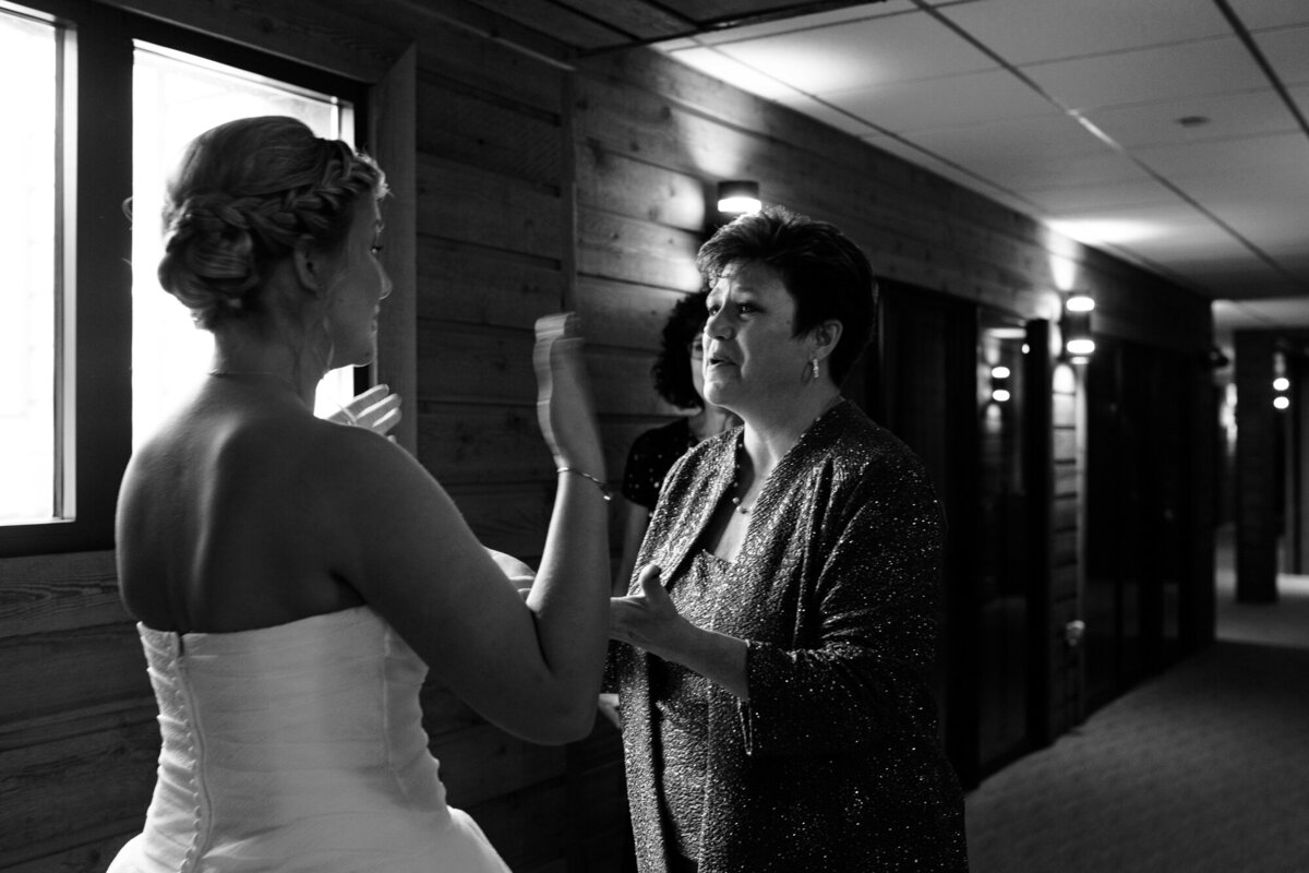 Bride gets emotional after first look with her mom and mother in law