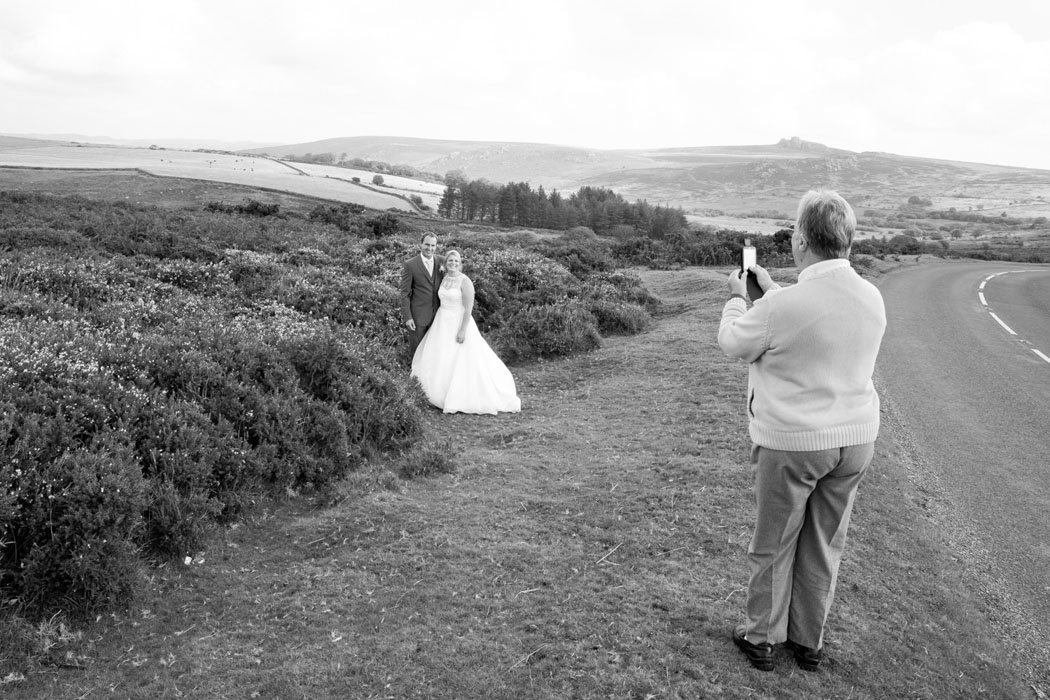 Bride & Groom being photographed on Dartmoor