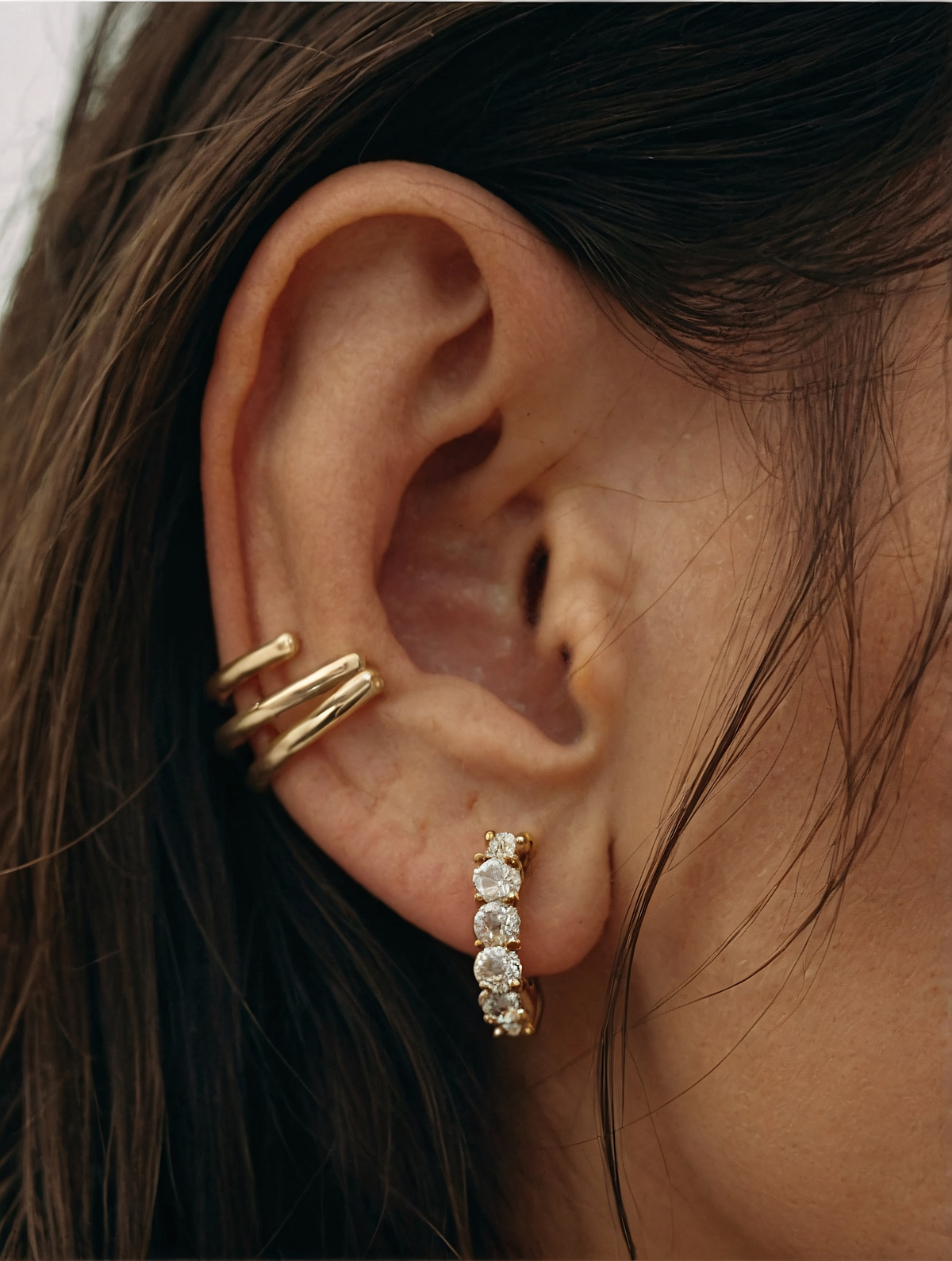 Close-up of Adorned Ear with Jewelry