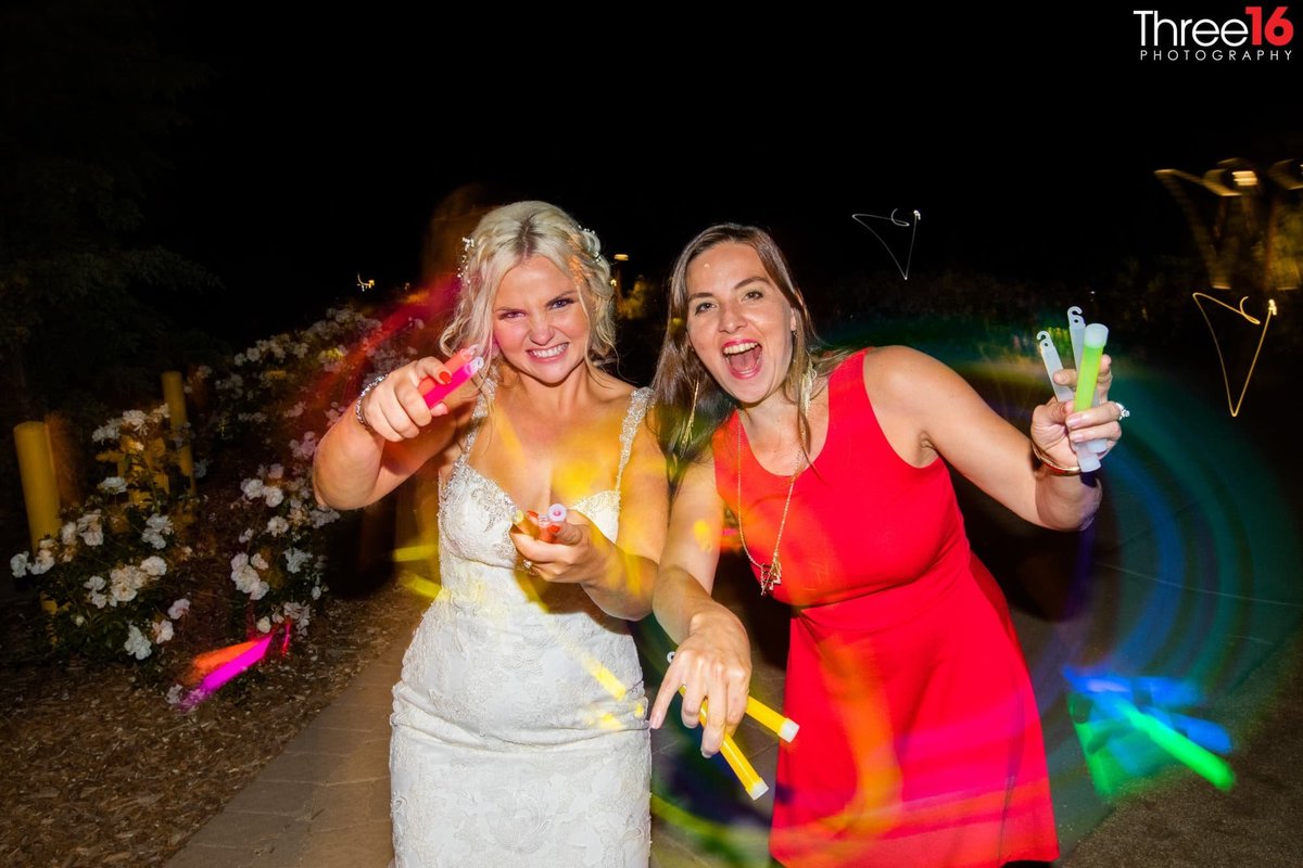 Bride and friend party at wedding reception