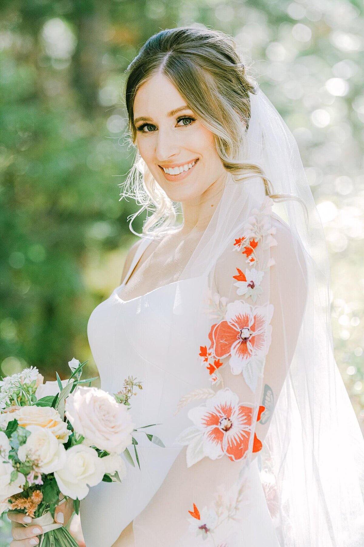 bride with flowery veil portrait taken at PlumpJacks Palisades Tahoe