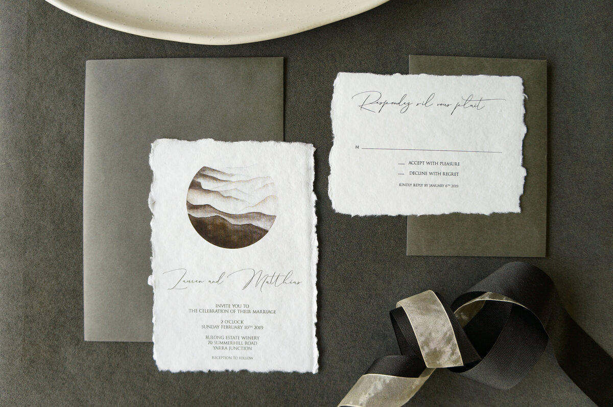 Black and white minimalist wedding invitation on handmade cotton paper and mountains design