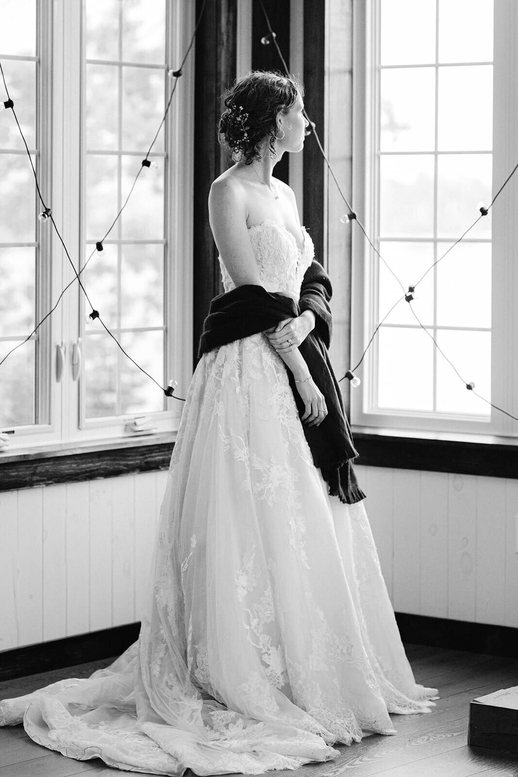 Alyssa-Marie-Photography-wedding-day-photo-bride-looks-out-window