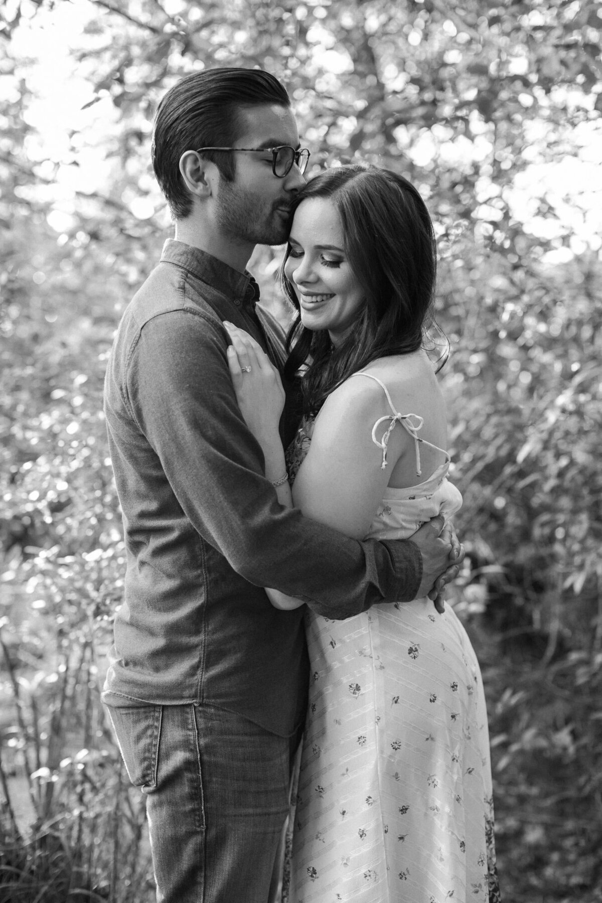 Romantic sweet engagement photos in forest in Woodinville WA relaxed candid photo by Joanna Monger Photography