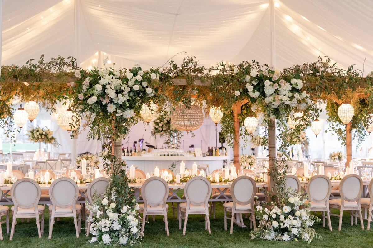 custom floral tented wedding head table