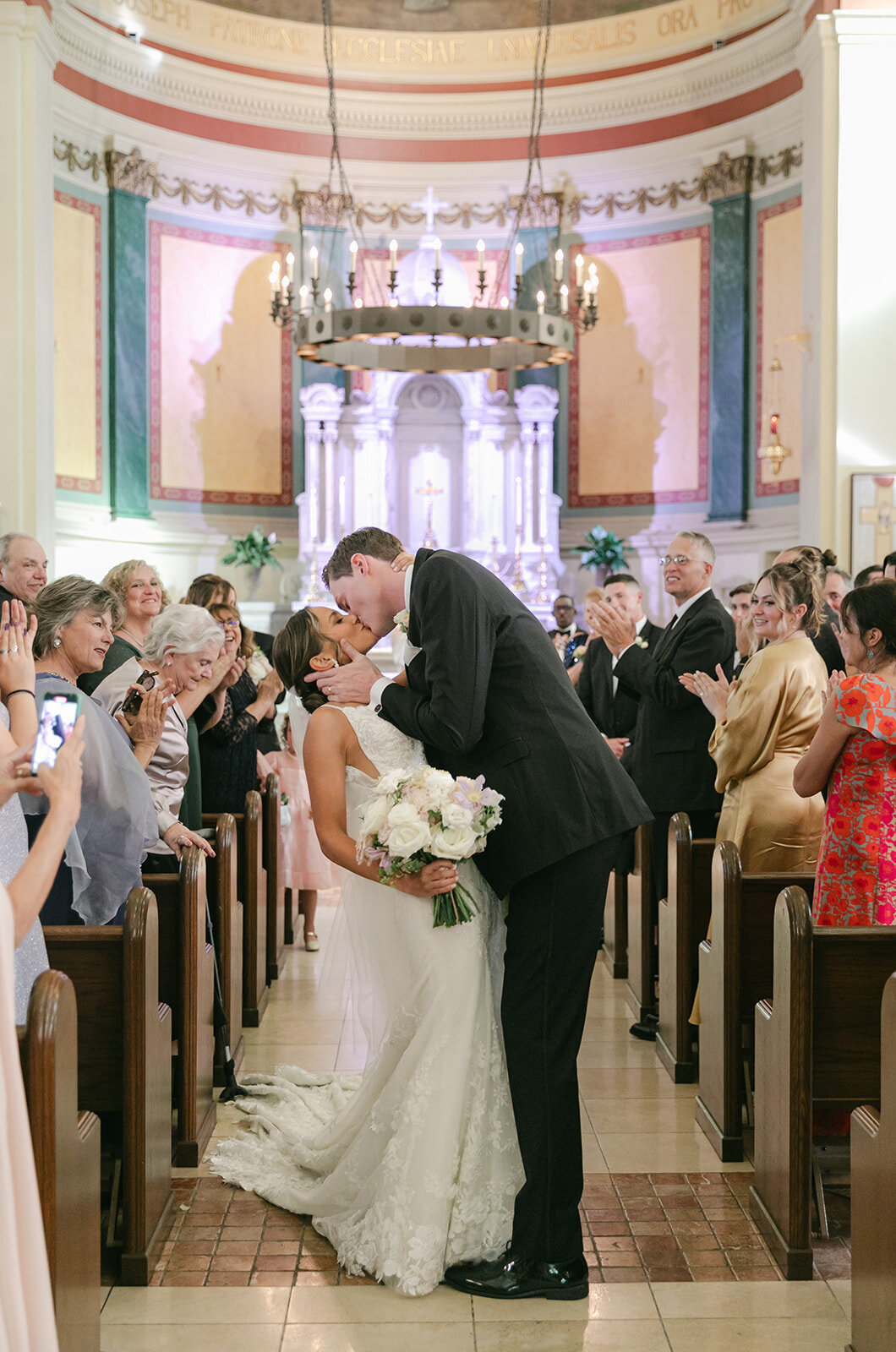 married-kiss-in-a-church-wedding-in-newport-ri