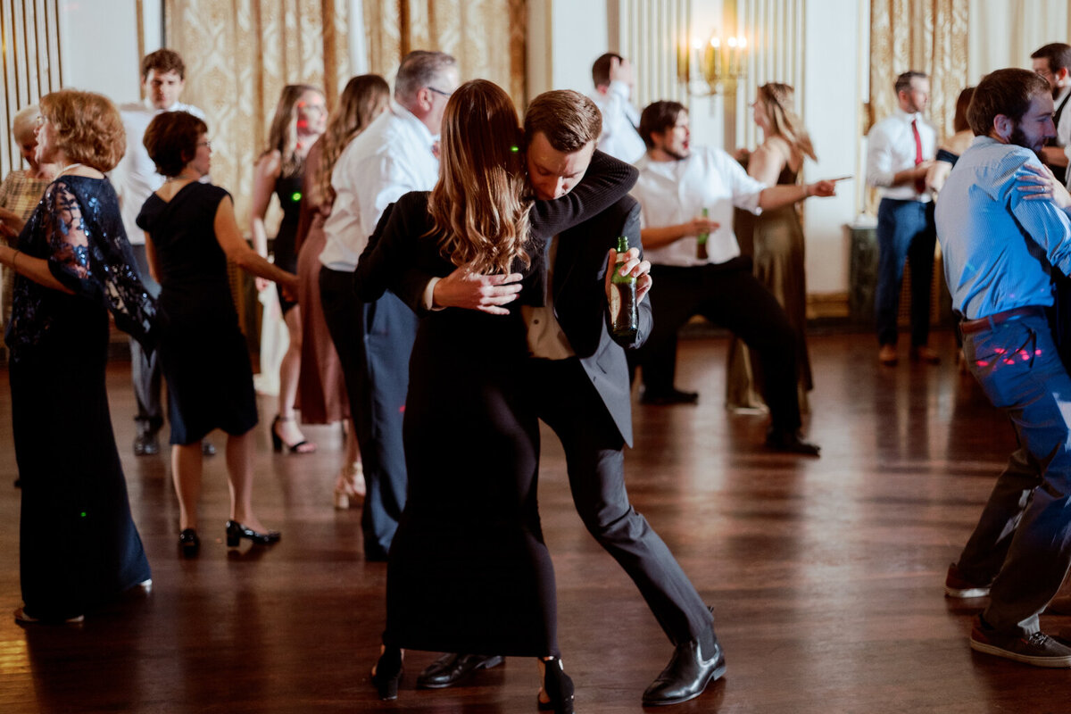 A couple dances at a funky wedding reception at the George Washington Hotel in Washington, PA