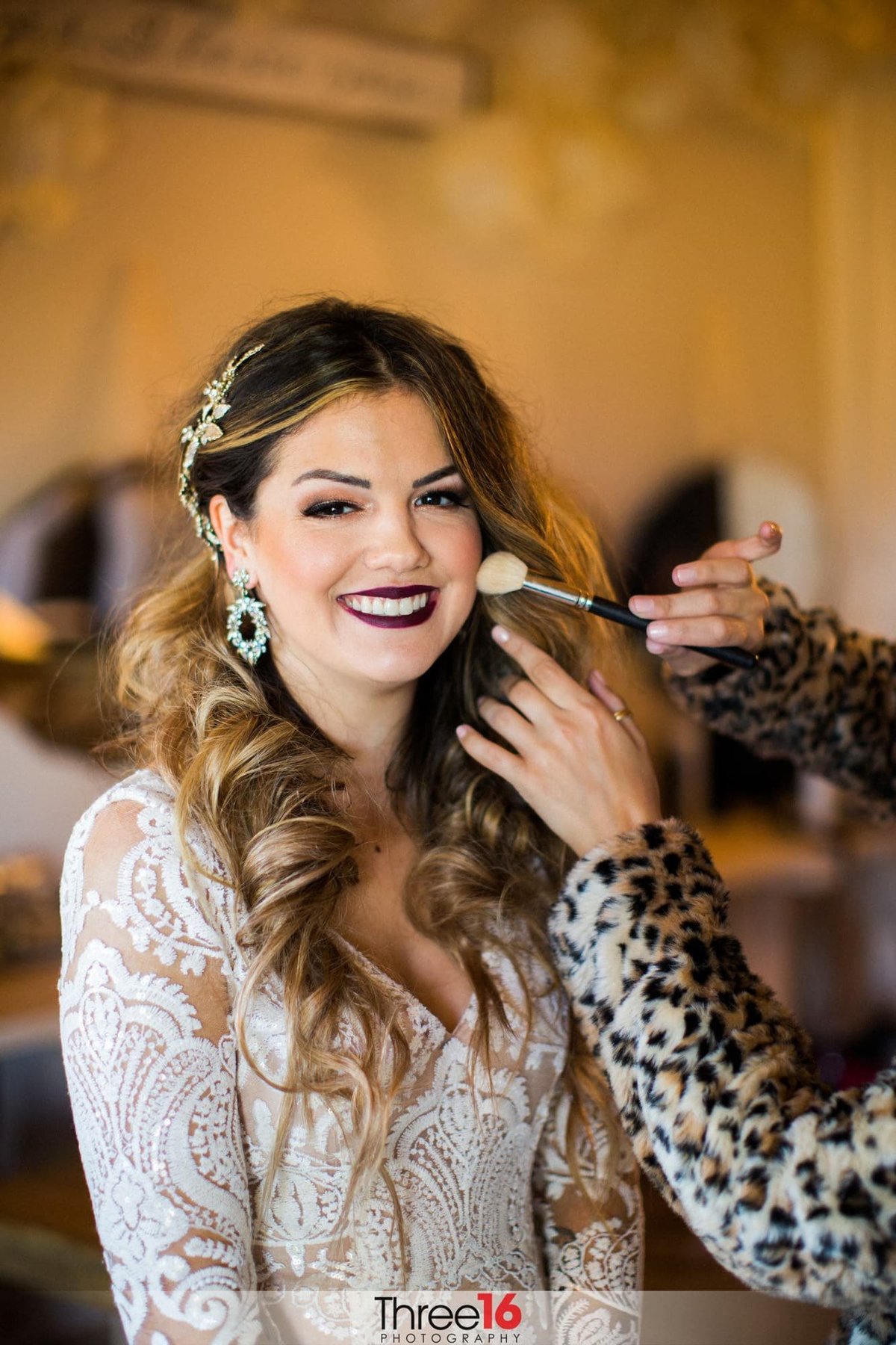 Bride getting dolled up before her wedding