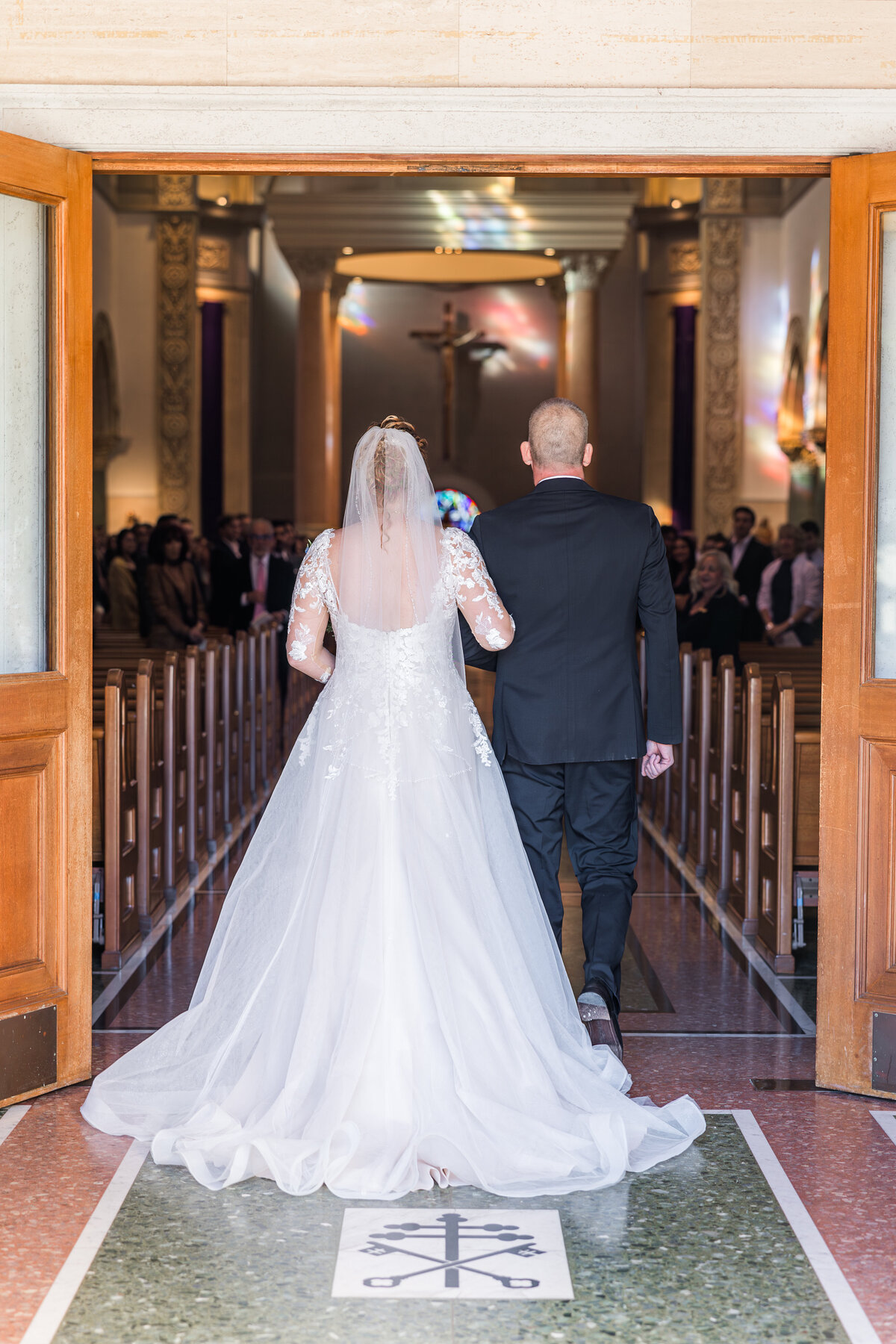 bride-and-father-entering-the-immaculata