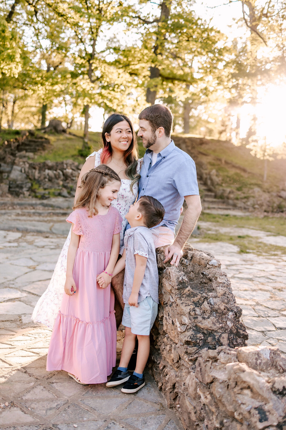 Gorgeous family of four at Silvan Springs park in Oakville, MO at sunset.