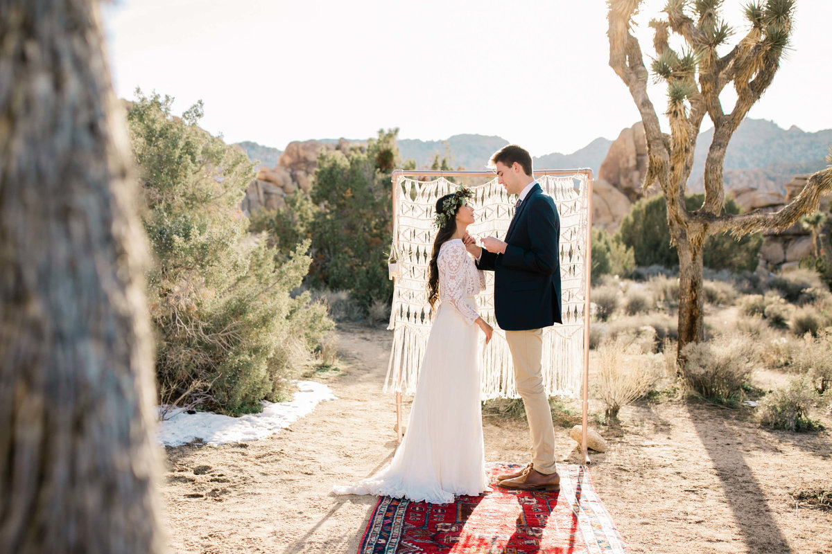 In joshua tree, the couple reads their vows to each other