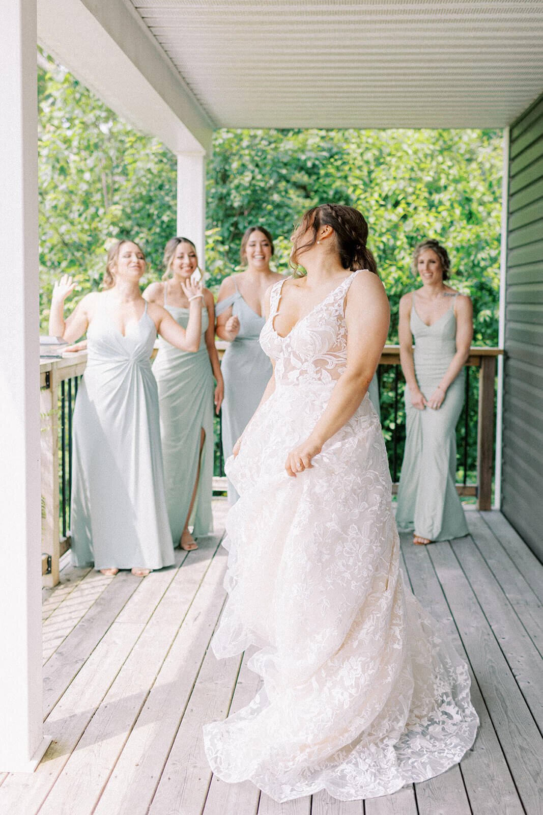 bride-turls-in-front-of-bridesmaids