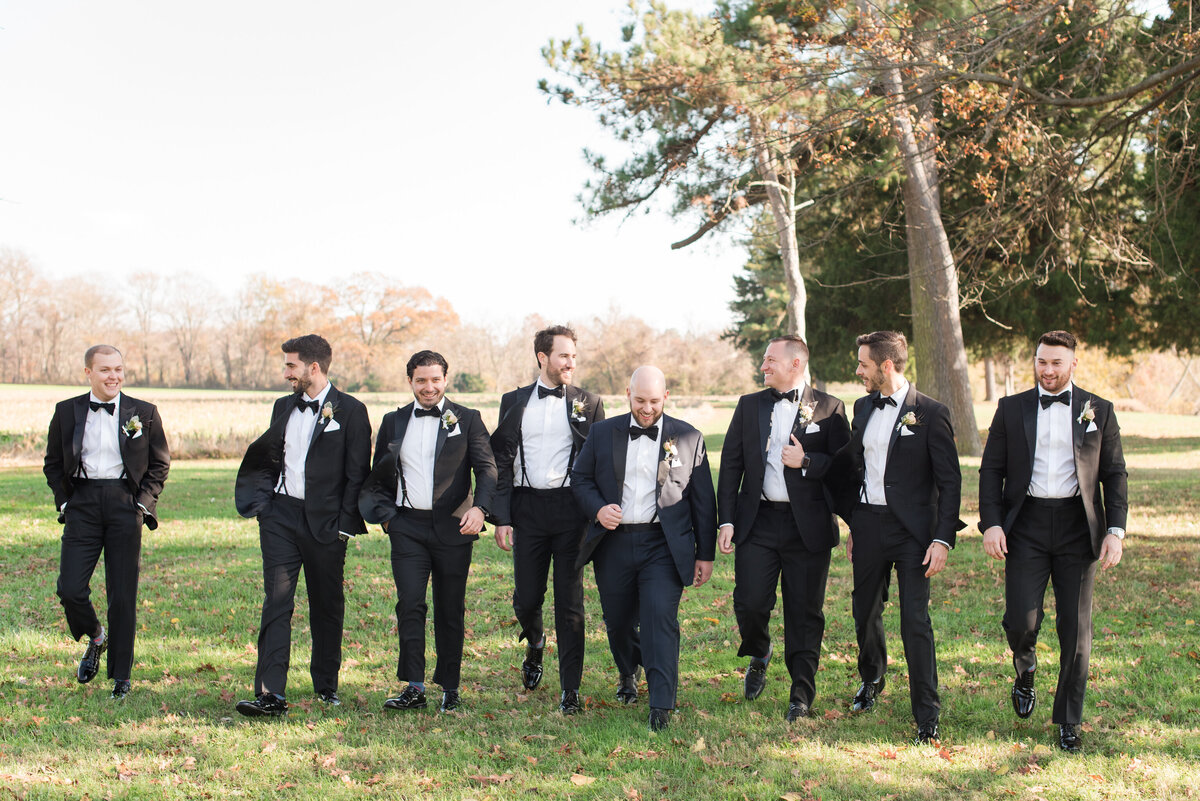 groom and groomsmen in black tuxedos brittland estates