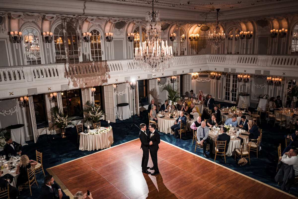 LGTBQ couple share their first dance at the Blackstone Hotel in Chicago, Illinois