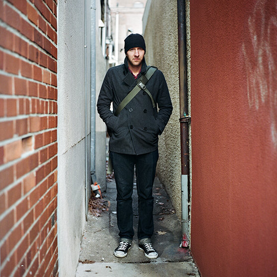 Portrait of a man in a small alley in philadelphia.