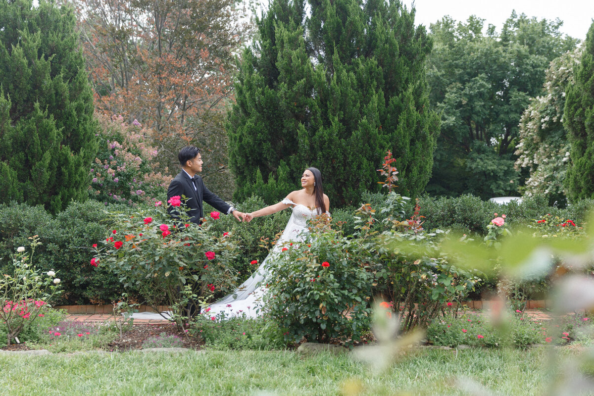 graceful bride and groom walking through exquisite garden weddingprofessional photographer The Jefferson  5-Star Boutique Hotel in Washington DC