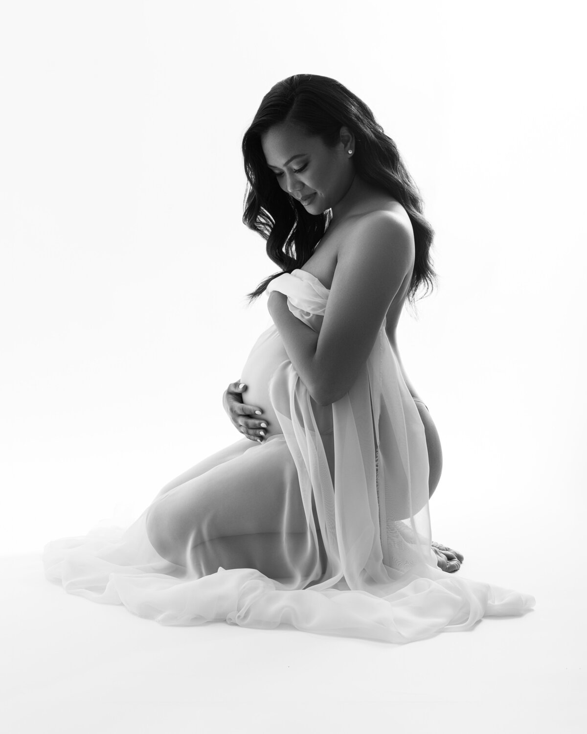 Maternity photography with drape