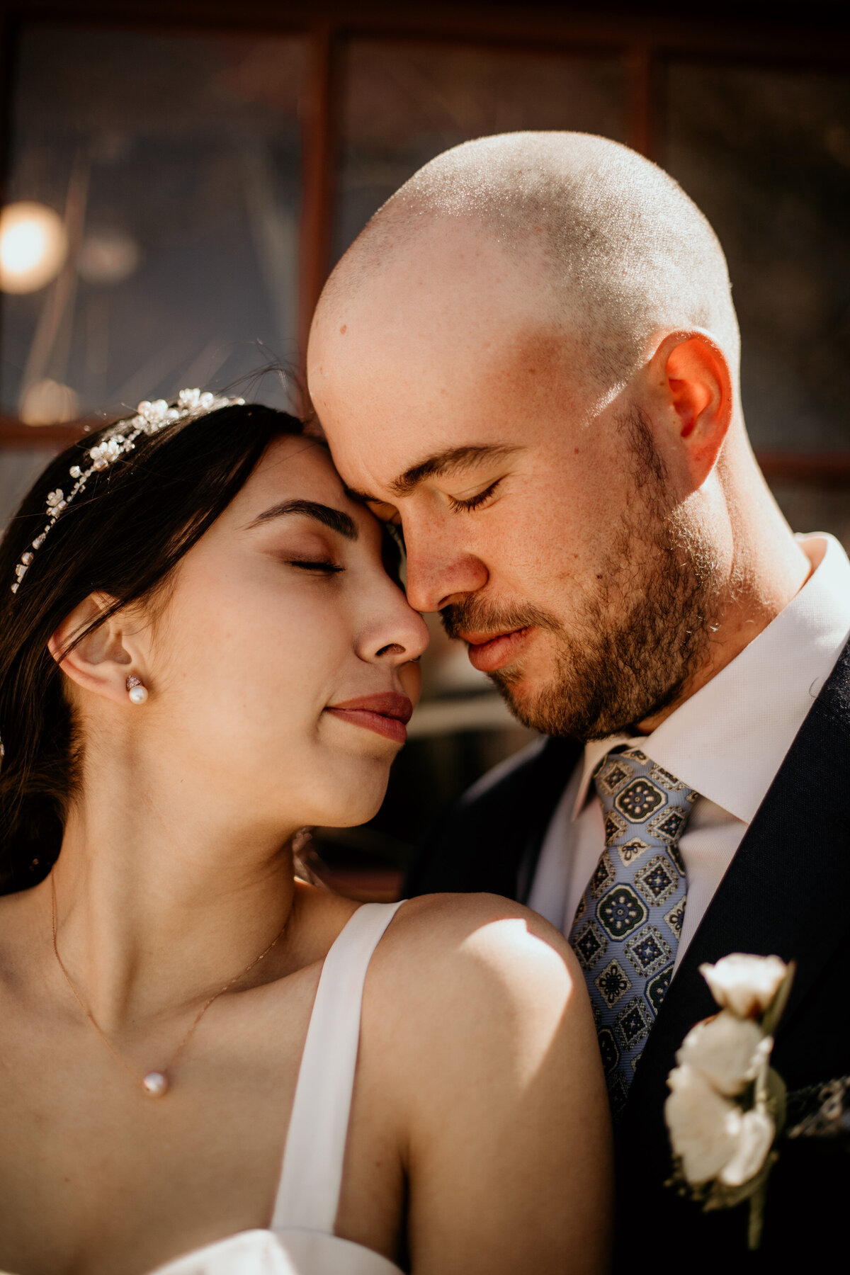 Bride and groom with heads close together