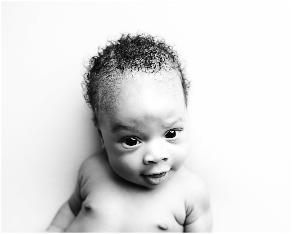 Black and white baby expression portrait