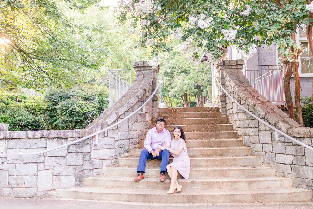 A couple at Piedmont Park in Atlanta Georgia for engagement portrait session by Jennifer Marie Studios, best Atlanta wedding photographer.