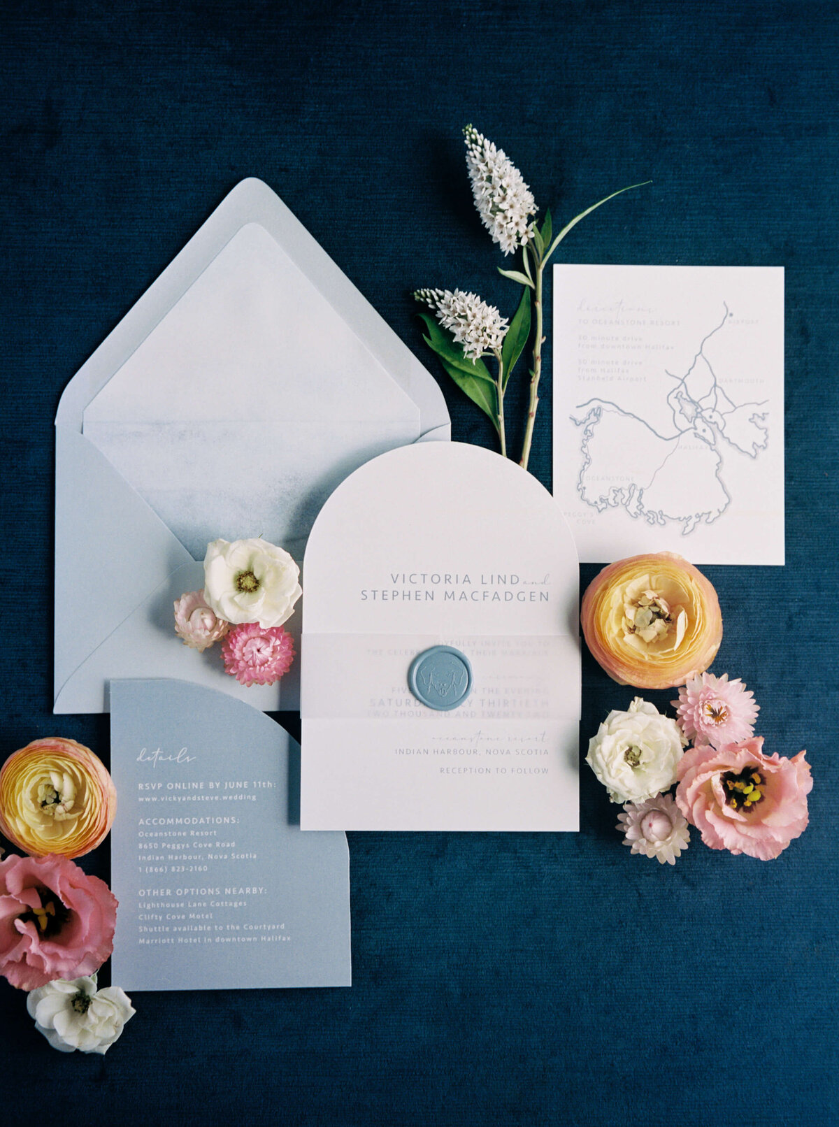 Wedding details including wedding invitations, and florals for Oceanstone Resort Wedding in Nova Scotia