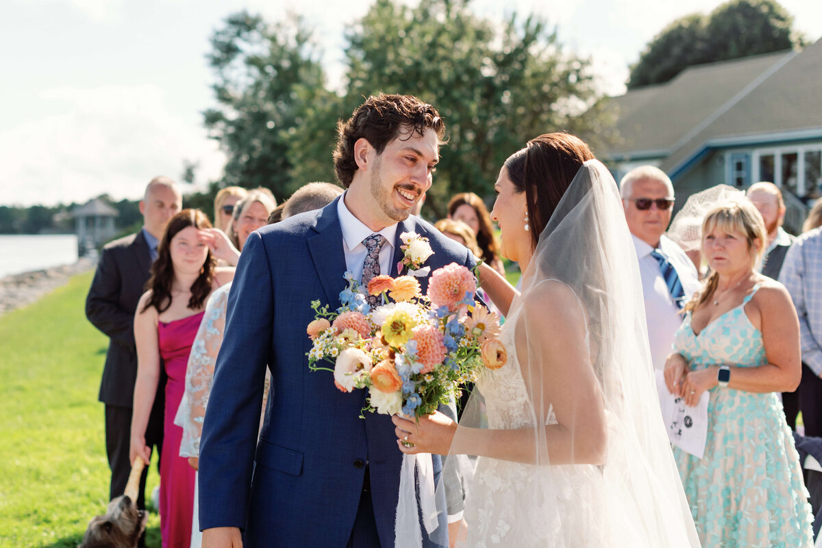 Bride and groom looking at each other at Oak Island Resort Wedding, Nova Scotia