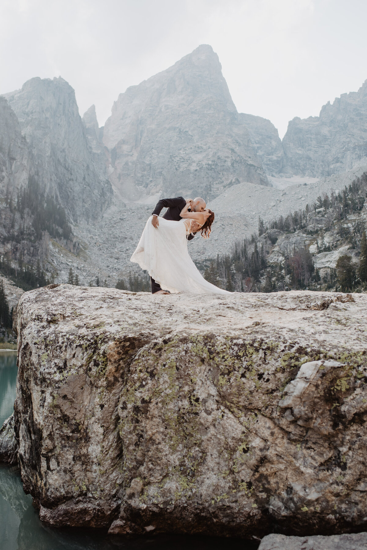 Jackson Hole photographers capture dip kiss after elopement ceremony