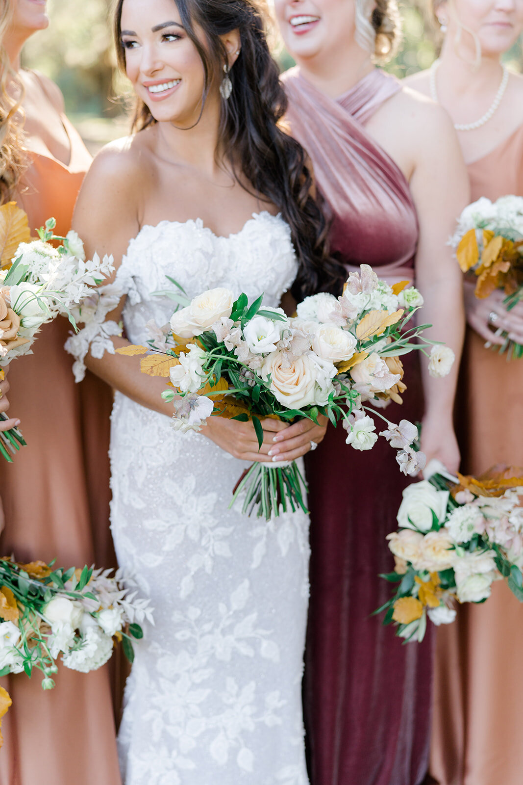 Boone Hall fall wedding. Jewel-toned bridesmaids dresses with maid of honor in a different color.  Kailee DiMeglio Photography.