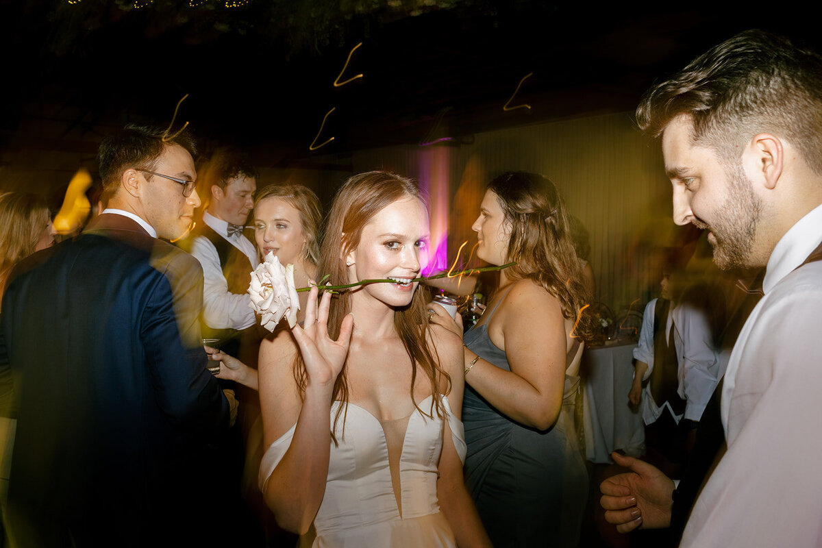 bride-with-rose-in-mouth