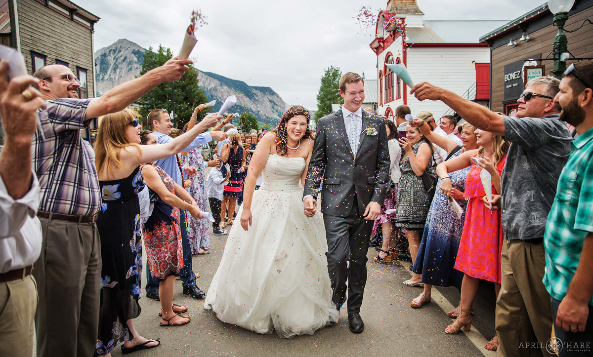 Fun Grand Exit Wedding Photography on Elk Avenue in Crested Butte Colorado