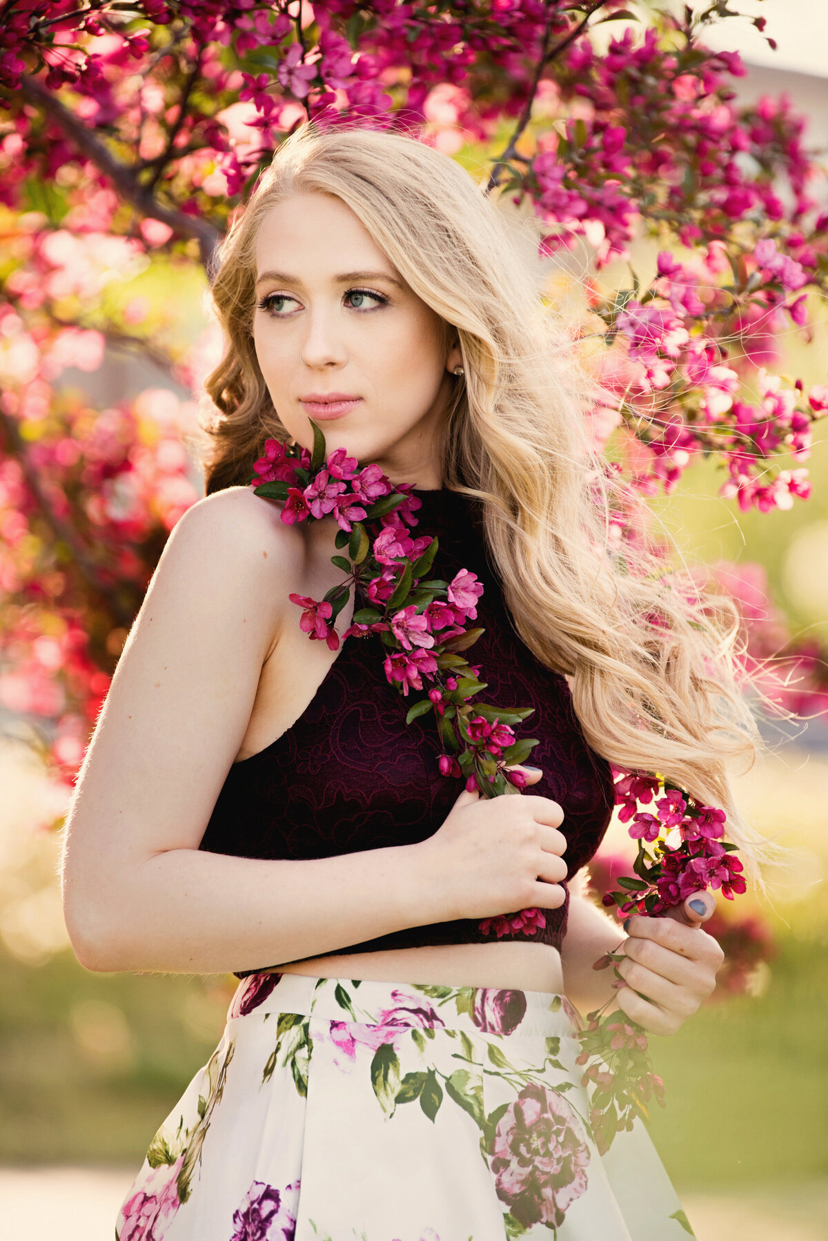 Orono Minnesota senior photo of girl in pink blossoms in spring