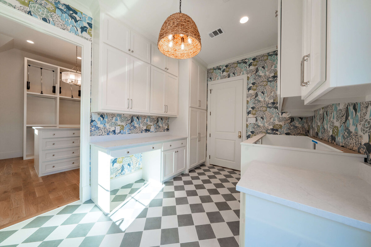 Laundry room with bright wallpaper and bold patterns