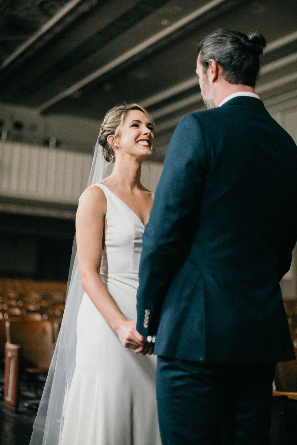 Bride and groom photographed together in this unique and  industrial Philadelphia wedding venue.