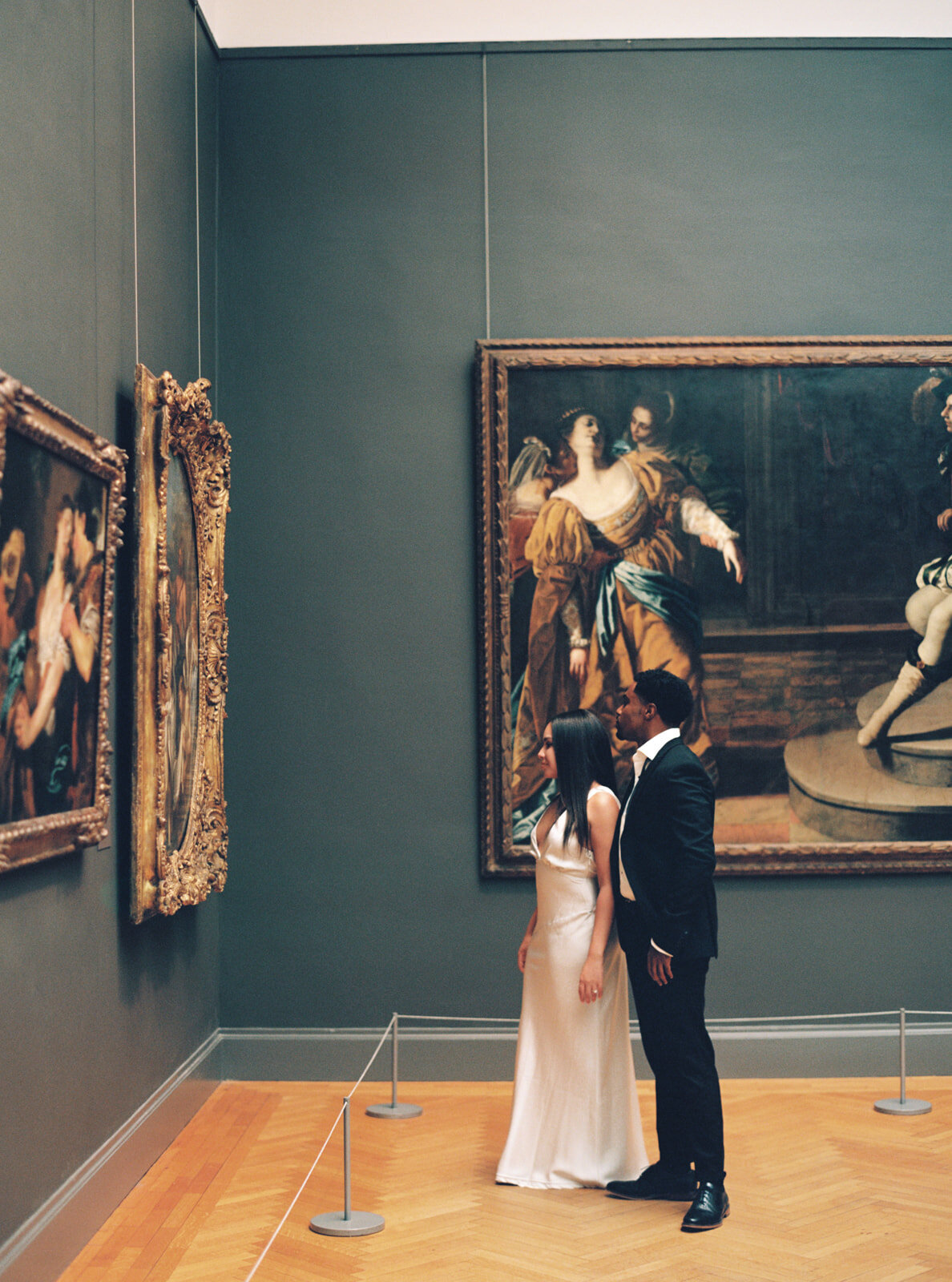 couple looking at art in a museum in manhattan
