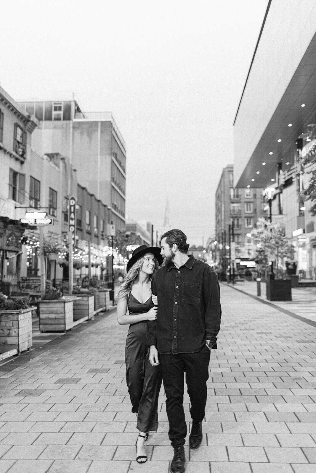 young-couple-link-arms-downtown-Halifax