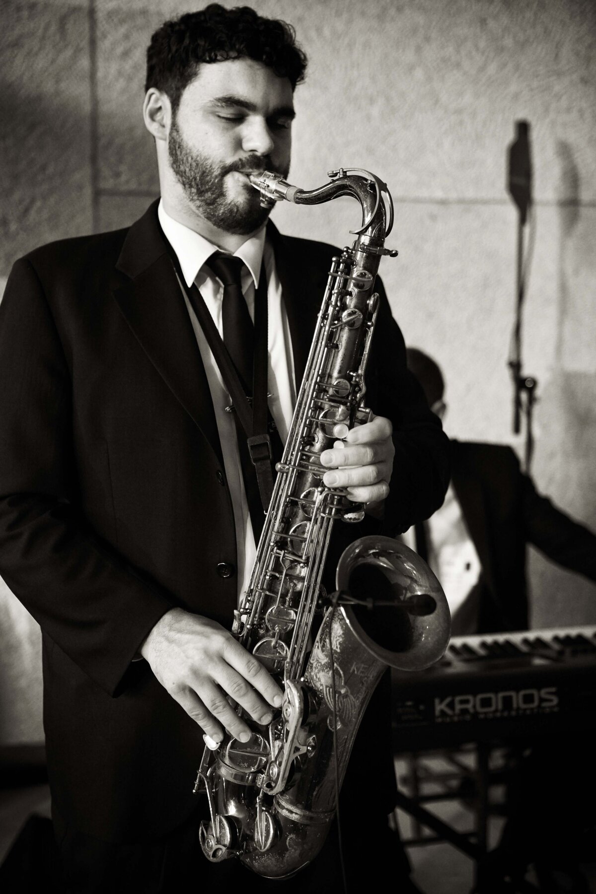Man Playing Saxophone at Rehearsla Dinner at Barnes Foundation