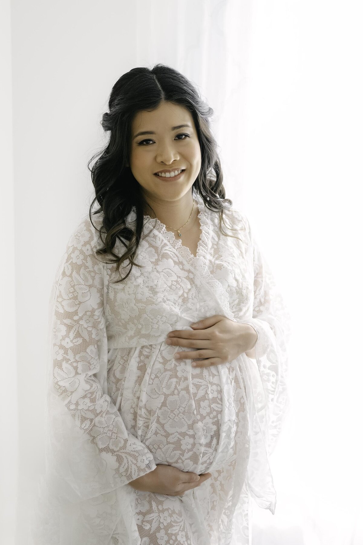 Maternity in White Dress