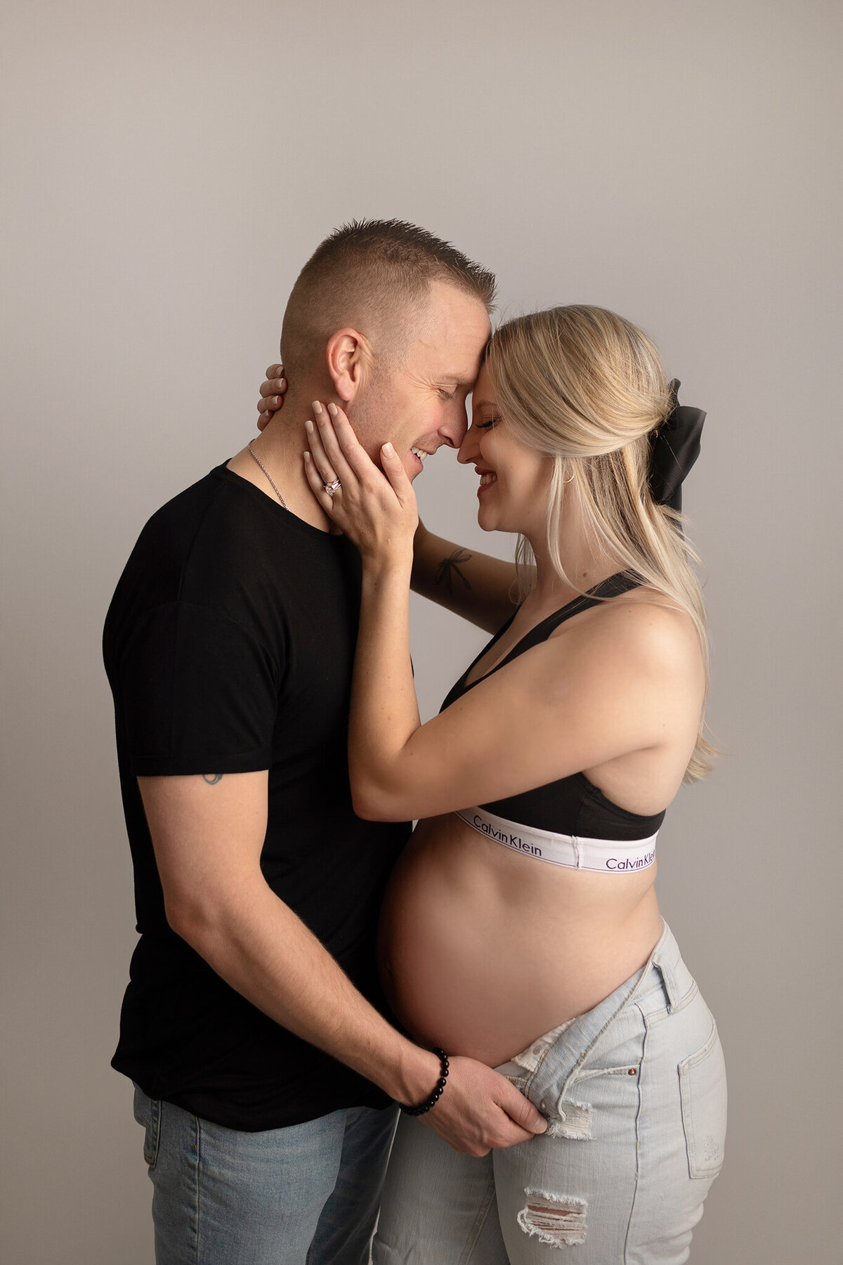 couple's maternity photos in denver studio