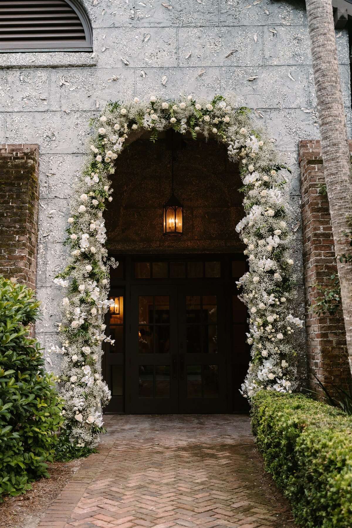 entrance of the Cloister at Sea Island with floral arch