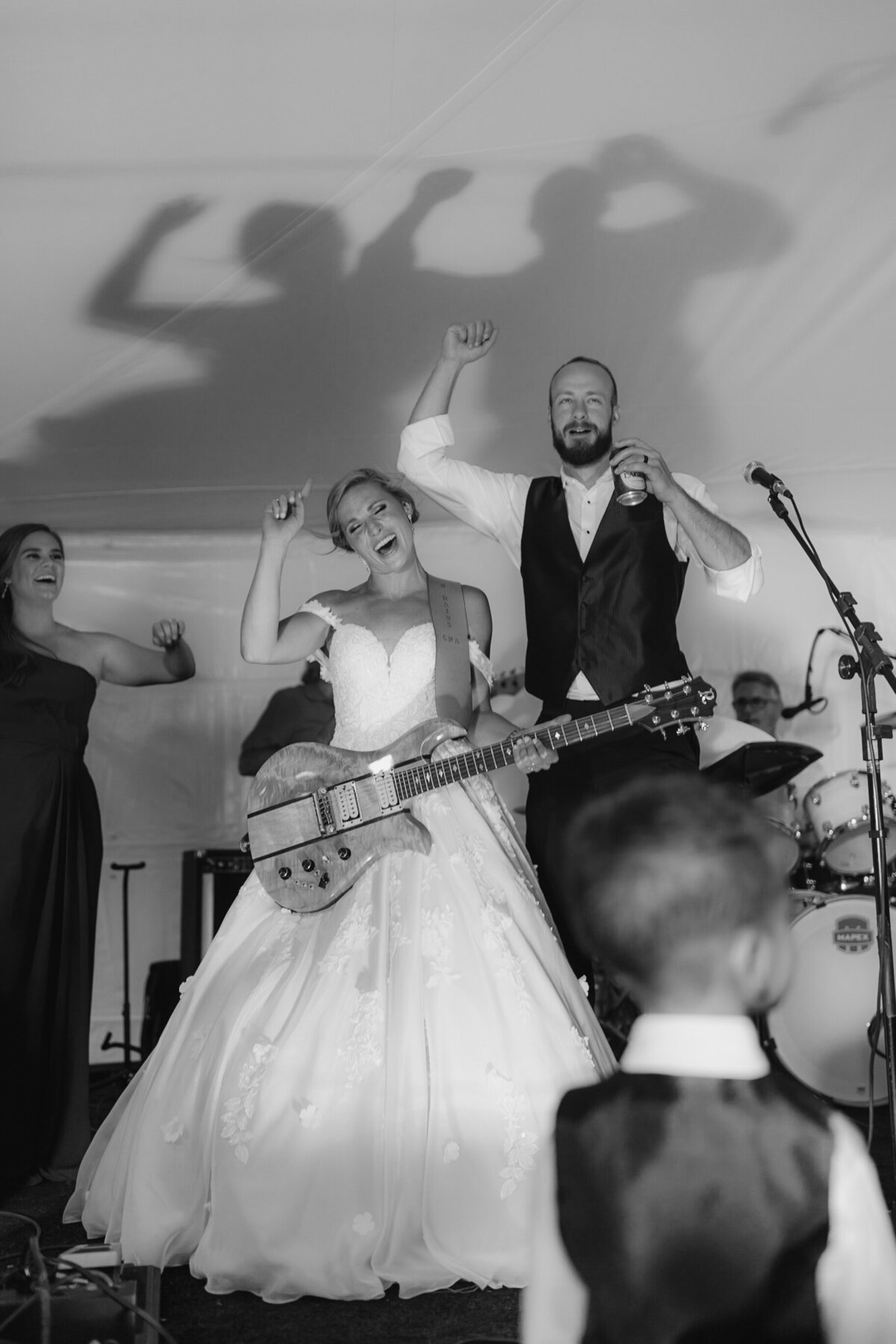 bride and groom performing at wedding reception