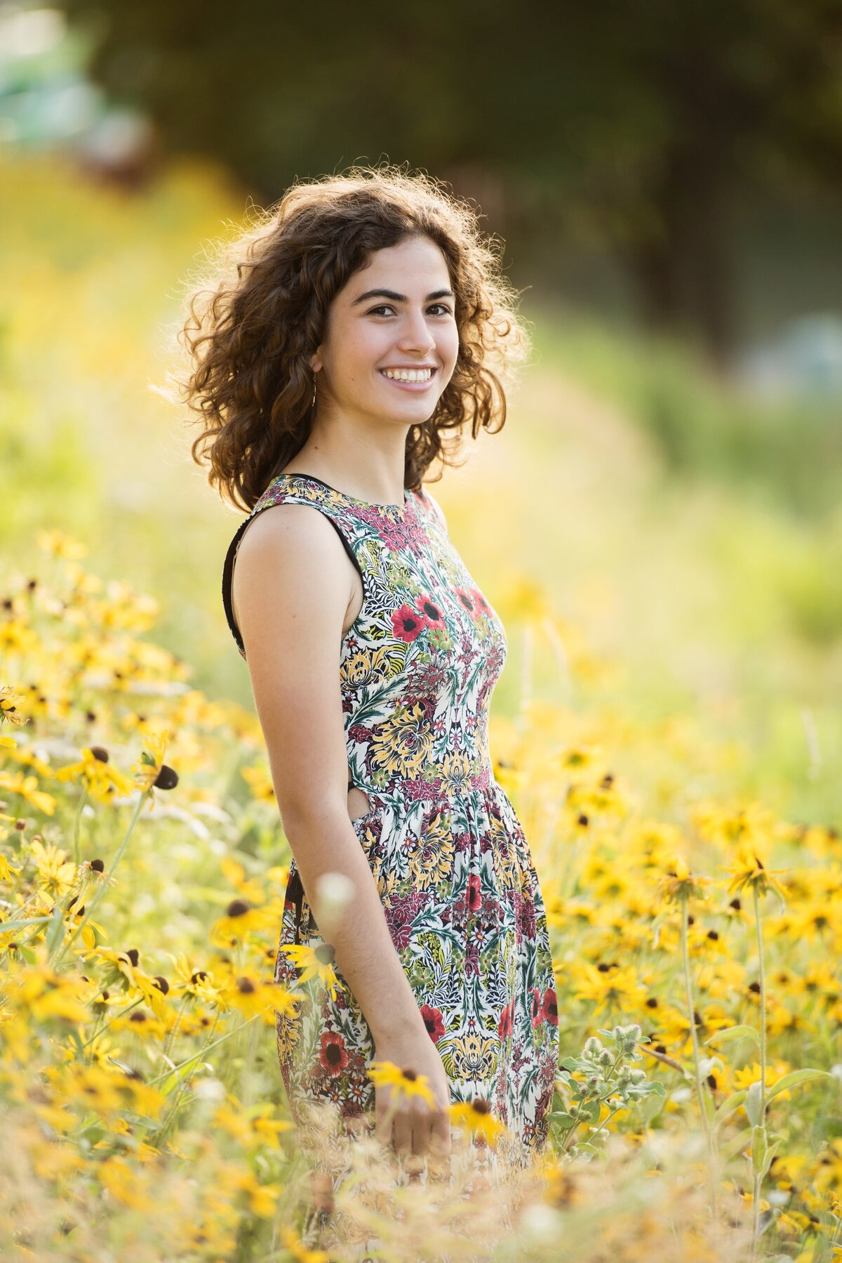 Edina Minnesota grad photo of girl in dress in a field of yellow flowers in nature