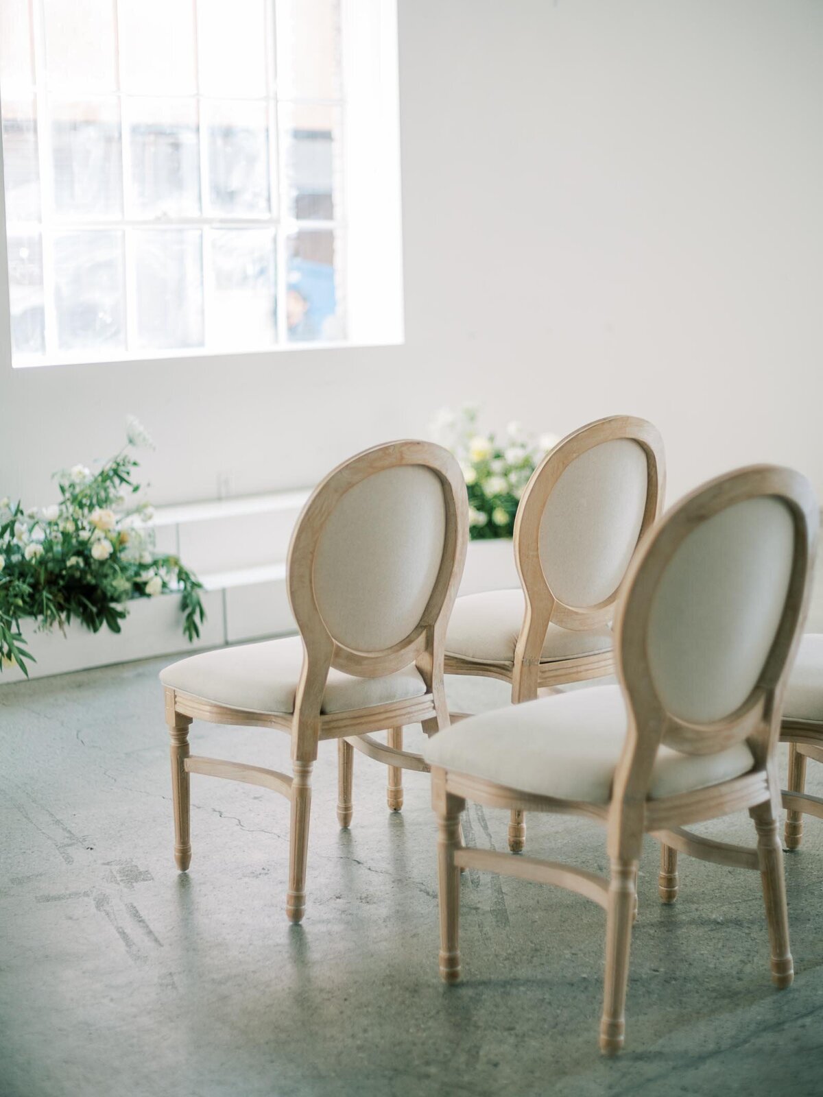 bluepansyfloral-ceremony-chairs-wood