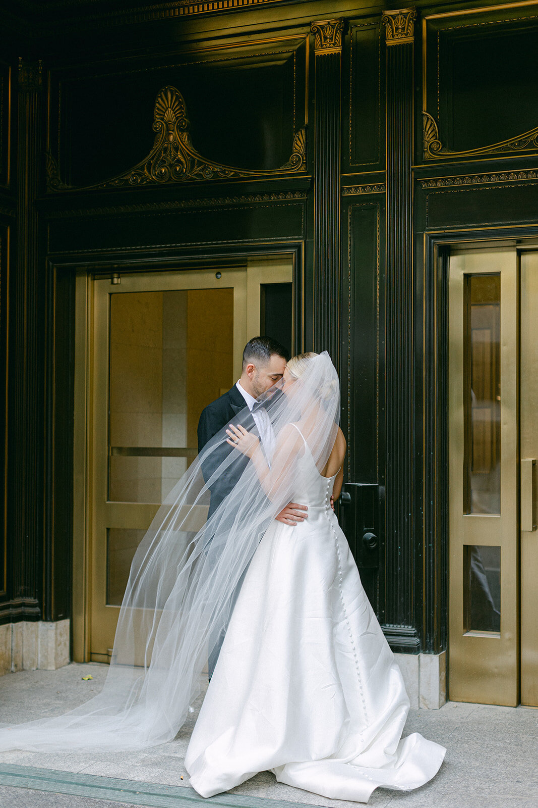 Bride and groom celebrating at the Omni William Penn Hotel wedding in Pittsburgh