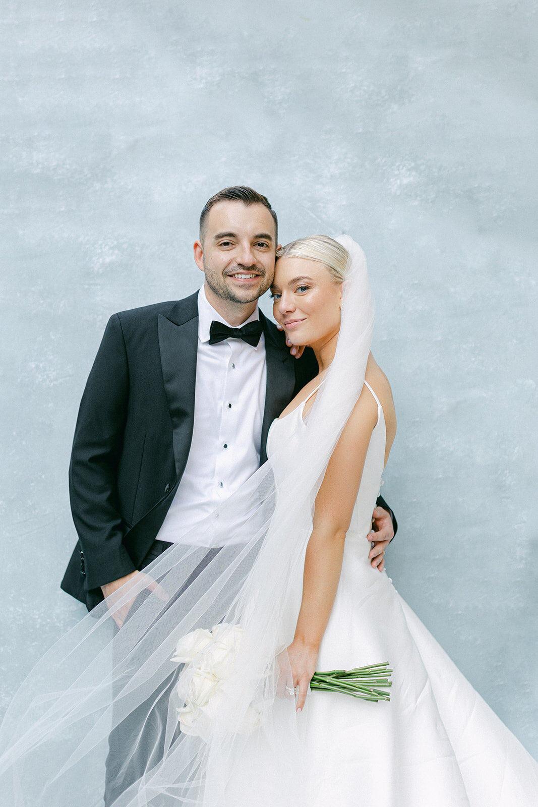 Bride and groom celebrating at the Omni William Penn Hotel wedding in Pittsburgh