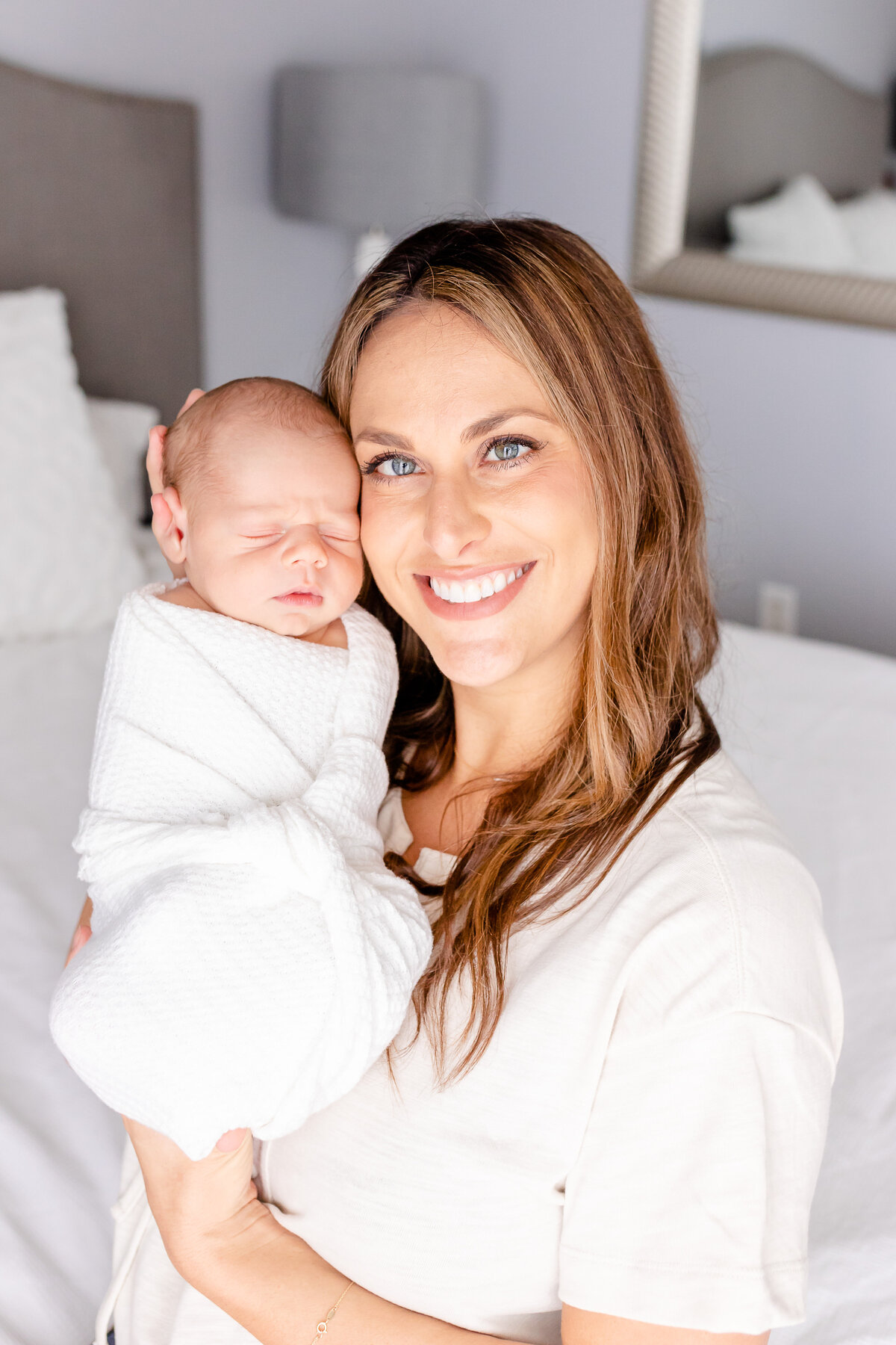 lifestyle newborn session with mom in Jacksonville