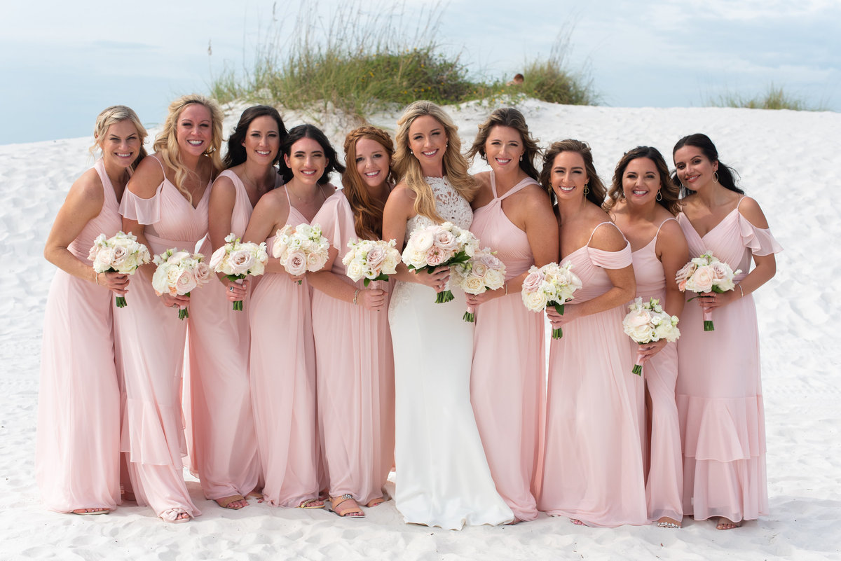 Blush and Gold Wedding at Hilton Clearwater Beach. bride tribe. bridal party. bridesmaids. tampa wedding planners. blush bridesmaid dresses.