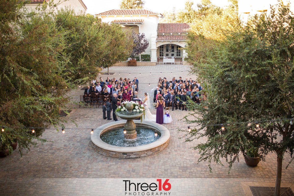 Aerial view of a Serra Plaza wedding ceremony in action