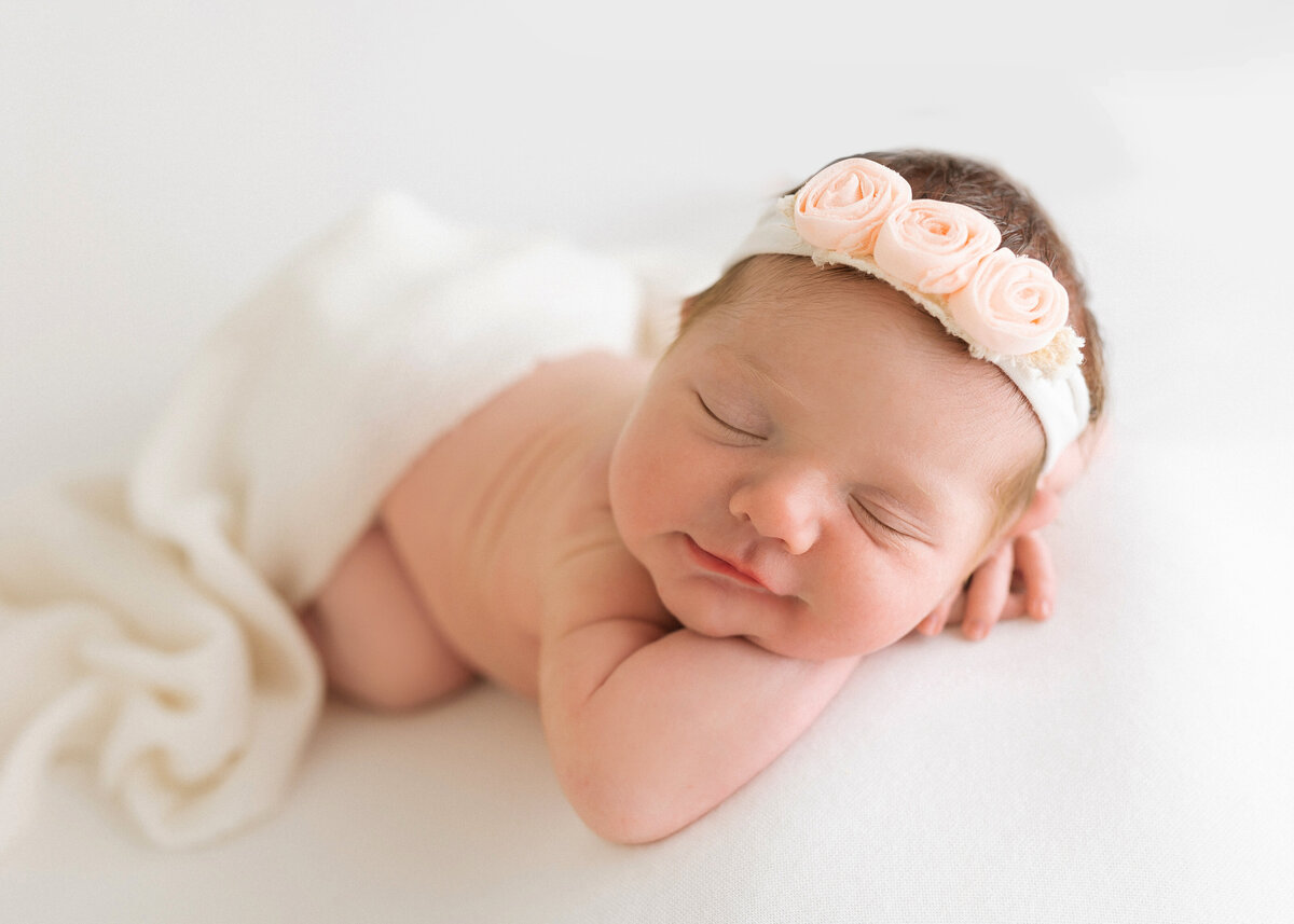 baby smiling while sleeping