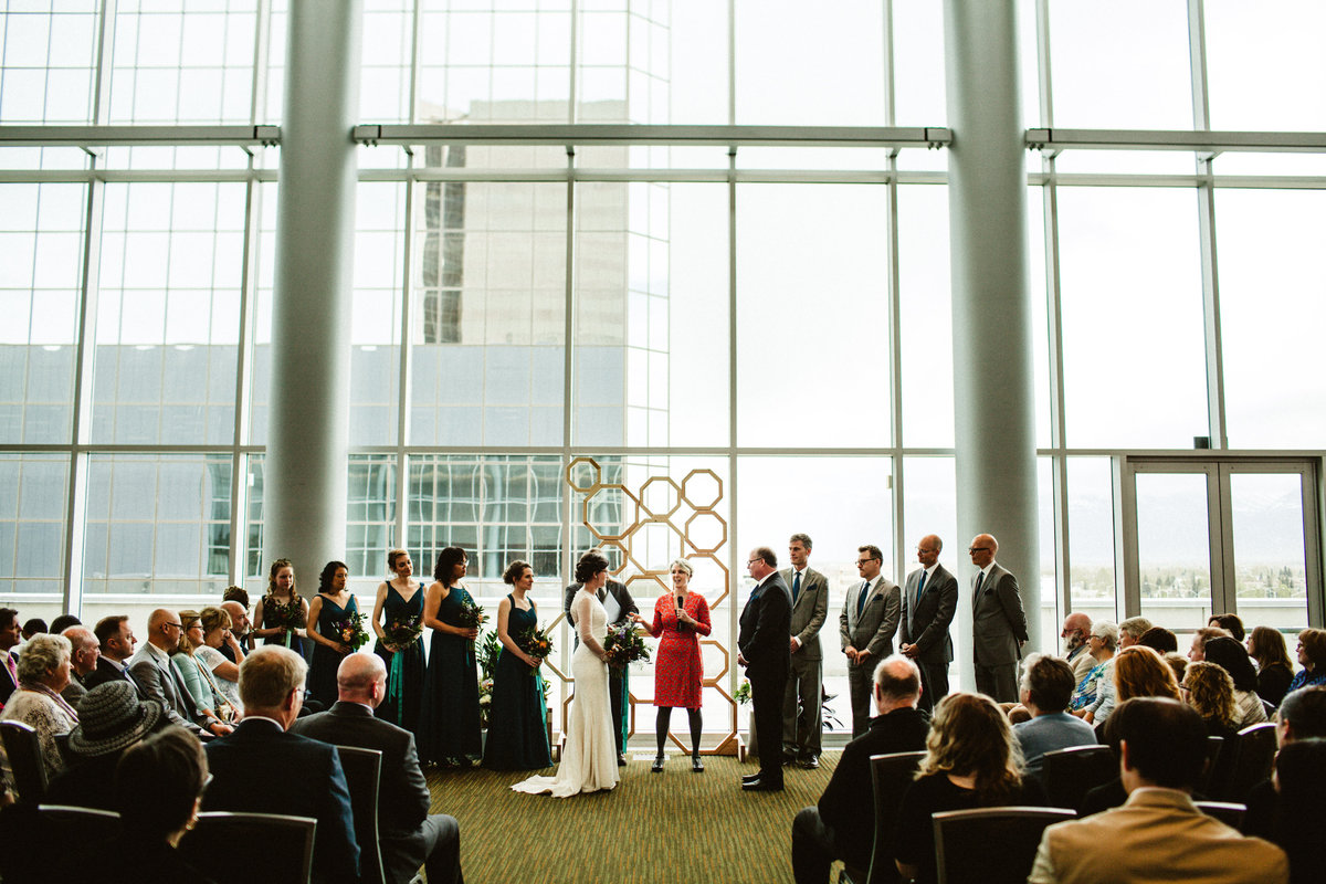 wide shot of urban wedding ceremony at dena'ina center