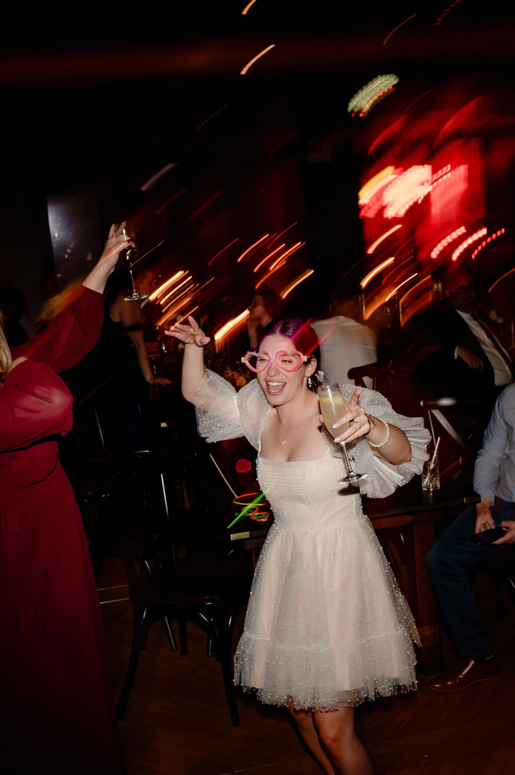 Bride dances in her reception dress